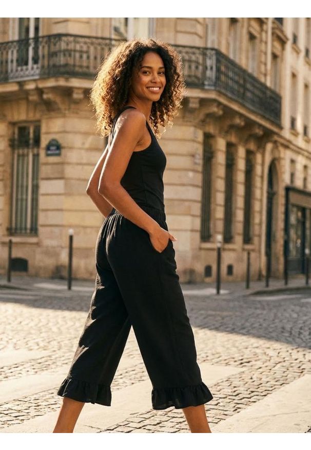 Sinsay - Spodnie - czarny. Kolor: czarny