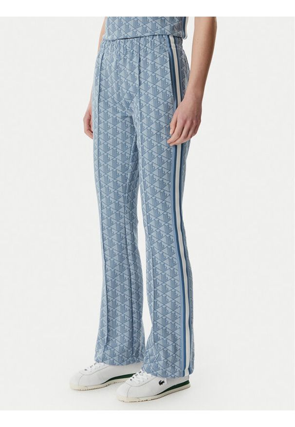 Lacoste Spodnie dresowe XF9313 Niebieski jasny Regular Fit. Kolor: niebieski. Materiał: syntetyk