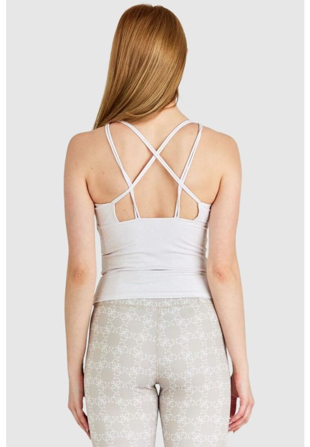 Guess - GUESS Sportowy top damski z ozdobnymi plecami, Rozmiar S. Kolor: beżowy. Materiał: poliester. Długość rękawa: na ramiączkach. Wzór: aplikacja. Styl: sportowy