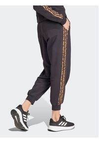 Adidas - adidas Spodnie dresowe Essentials 3-Stripes IS2155 Czarny Loose Fit. Kolor: czarny. Materiał: bawełna #2
