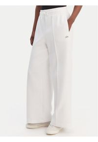Lacoste Spodnie dresowe XF0041 Biały Relaxed Fit. Kolor: biały. Materiał: bawełna #1