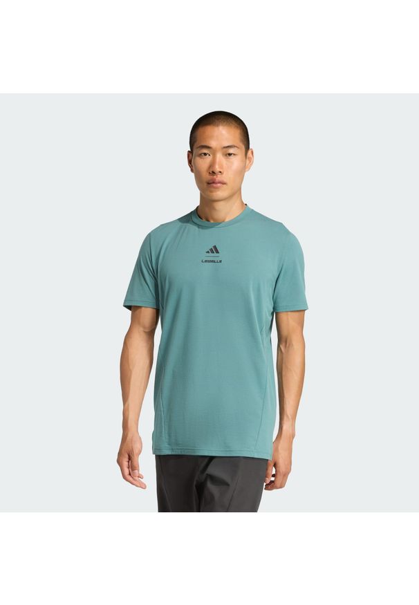 Adidas - Koszulka Les Mills Graphic. Kolor: niebieski. Technologia: ClimaCool (Adidas). Sport: fitness