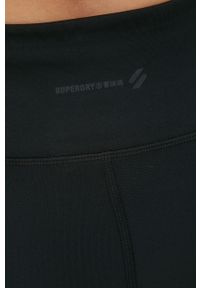 Superdry legginsy damskie kolor czarny gładkie. Stan: podwyższony. Kolor: czarny. Materiał: materiał. Wzór: gładki #2