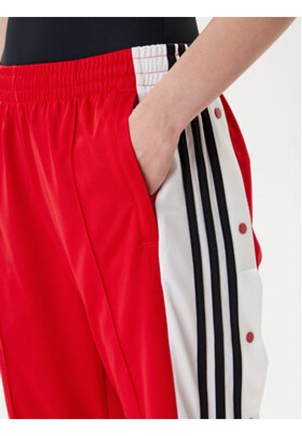Adidas - adidas Spodnie dresowe Adibreak JY1354 Czerwony Loose Fit. Kolor: czerwony. Materiał: syntetyk