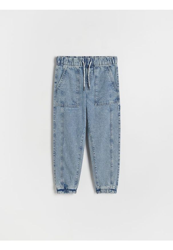 Reserved - Jeansy jogger fit - niebieski. Kolor: niebieski