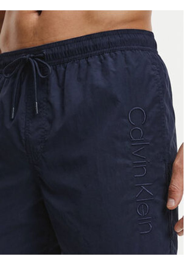 Calvin Klein Swimwear Szorty kąpielowe LV00N61029 Granatowy Regular Fit. Kolor: niebieski. Materiał: syntetyk