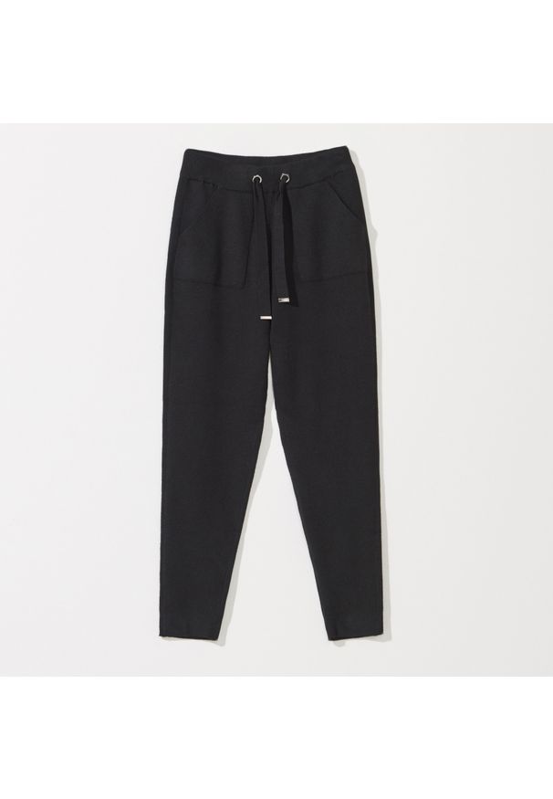 Mohito - Dzianinowe spodnie - Czarny. Kolor: czarny. Materiał: dzianina