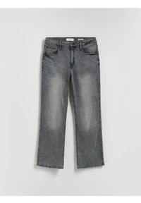 Reserved - Jeansy bootcut z efektem sprania - jasnoszary. Kolor: szary