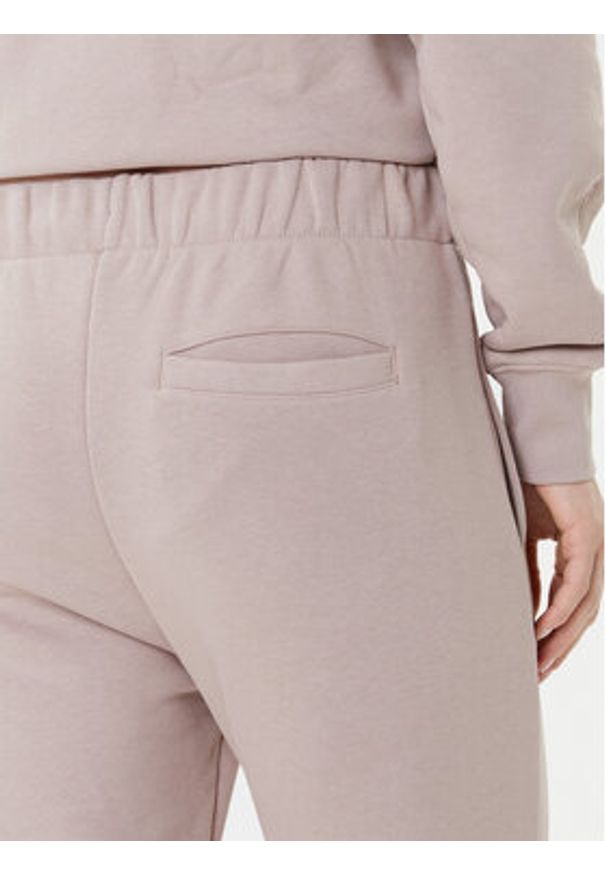On Spodnie dresowe Club Pants 1WE1005 Beżowy Relaxed Fit. Kolor: beżowy. Materiał: bawełna