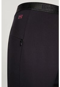 Wolford Spodnie damskie kolor czarny dopasowane high waist. Stan: podwyższony. Kolor: czarny