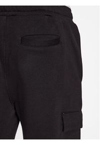 Fila Spodnie dresowe FAM0548 Czarny Regular Fit. Kolor: czarny. Materiał: bawełna