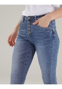 Unisono - SPODNIE JEANSOWE. Materiał: jeans. Wzór: gładki. Styl: klasyczny