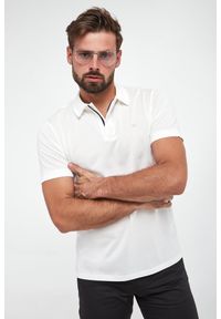 Emporio Armani - Polo męskie EMPORIO ARMANI. Typ kołnierza: polo