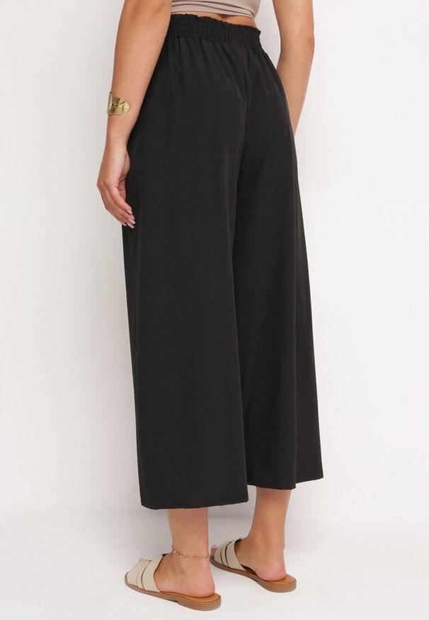 Born2be - Czarne Szerokie Spodnie z Wysokim Stanem Wiskozą i Gumką w Pasie Criseldas. Okazja: na co dzień, na spotkanie biznesowe, do pracy. Stan: podwyższony. Kolor: czarny. Materiał: wiskoza. Długość: długie. Styl: casual, biznesowy, elegancki