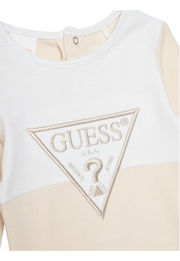 Guess Pajac H5YW07 KA6W4 Beżowy. Kolor: beżowy. Materiał: bawełna
