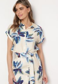 Born2be - Beżowa Wiskozowa Koszula z Krótkim Rękawem we Florystyczny Print Venaia. Okazja: na spotkanie biznesowe, do pracy. Kolor: beżowy. Materiał: wiskoza. Długość rękawa: krótki rękaw. Długość: krótkie. Wzór: nadruk. Sezon: lato. Styl: elegancki, biznesowy #6