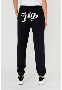 Juicy Couture - JUICY COUTURE Czarne spodnie Sora. Kolor: czarny. Materiał: bawełna