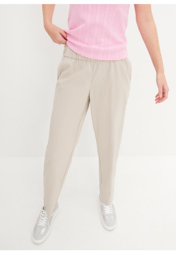 bonprix - Spodnie chino w krótszej długości. Kolor: beżowy. Długość: krótkie. Styl: elegancki