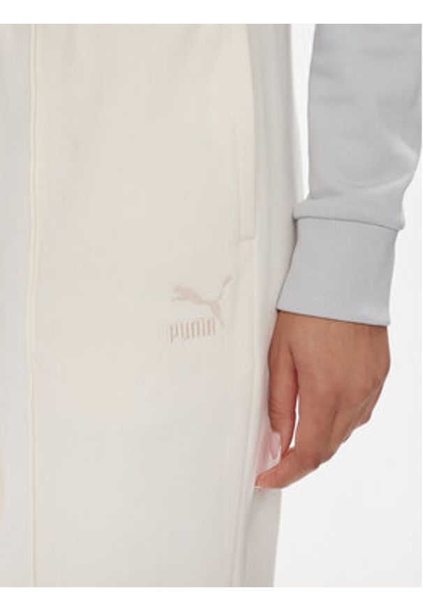 Puma Spodnie dresowe Classic 535685 Écru Relaxed Fit. Materiał: bawełna