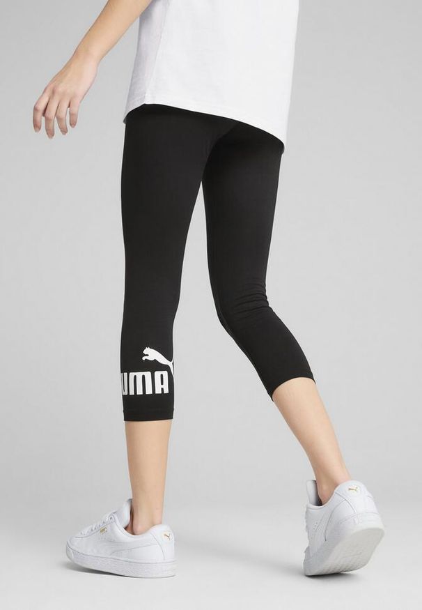 Puma - Damskie legginsy 3/4 z małym logo No. 1 ESS PUMA Black. Kolor: czarny. Materiał: guma. Wzór: nadruk