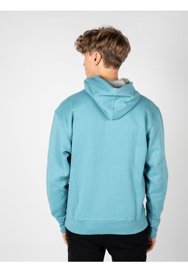 Champion Bluza "Hoodie" | HBGF89H586N9A | Mężczyzna | Błękitny. Okazja: na co dzień. Typ kołnierza: kaptur. Kolor: niebieski. Materiał: poliester, bawełna. Wzór: aplikacja. Styl: casual