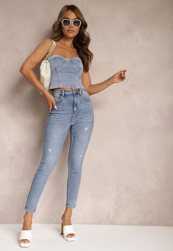 Renee - Jasnoniebieskie Casualowe Skinny Jeansy z Bawełny z Przetarciami na Nogawkach Cirea. Okazja: na co dzień. Kolor: niebieski. Styl: casual