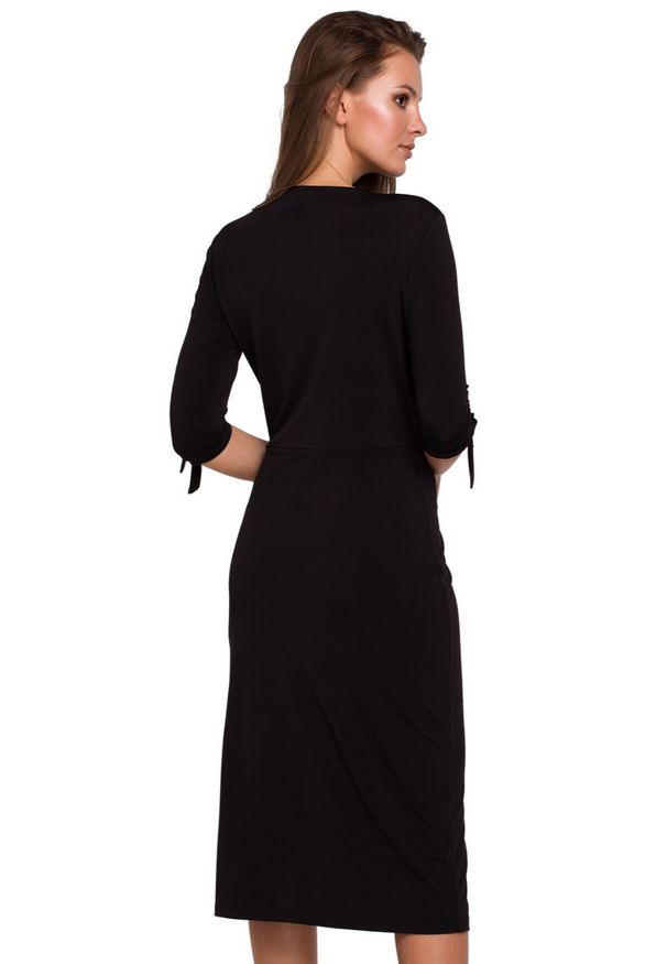 Makover - Elegancka sukienka prosty fason z rozcięciem. Okazja: na co dzień. Materiał: dzianina. Wzór: gładki. Typ sukienki: proste. Styl: elegancki, casual. Długość: midi