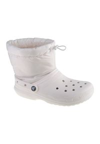 Buty Crocs Classic Lined Neo Puff Boot W 206630-143 białe. Wysokość cholewki: przed kolano. Kolor: biały. Materiał: guma, syntetyk. Szerokość cholewki: normalna