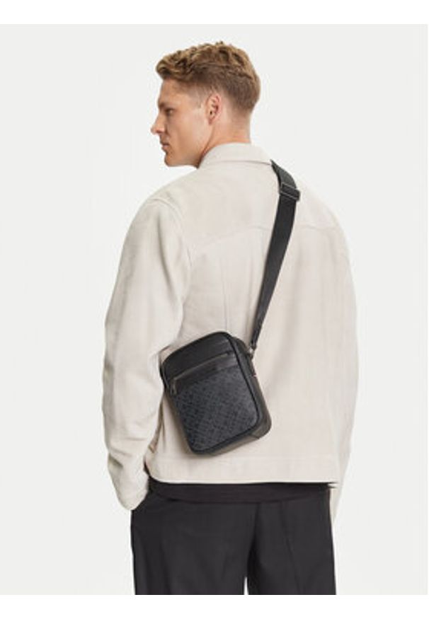 TOMMY HILFIGER - Tommy Hilfiger Saszetka AM0AM13493 Czarny. Kolor: czarny. Materiał: skóra