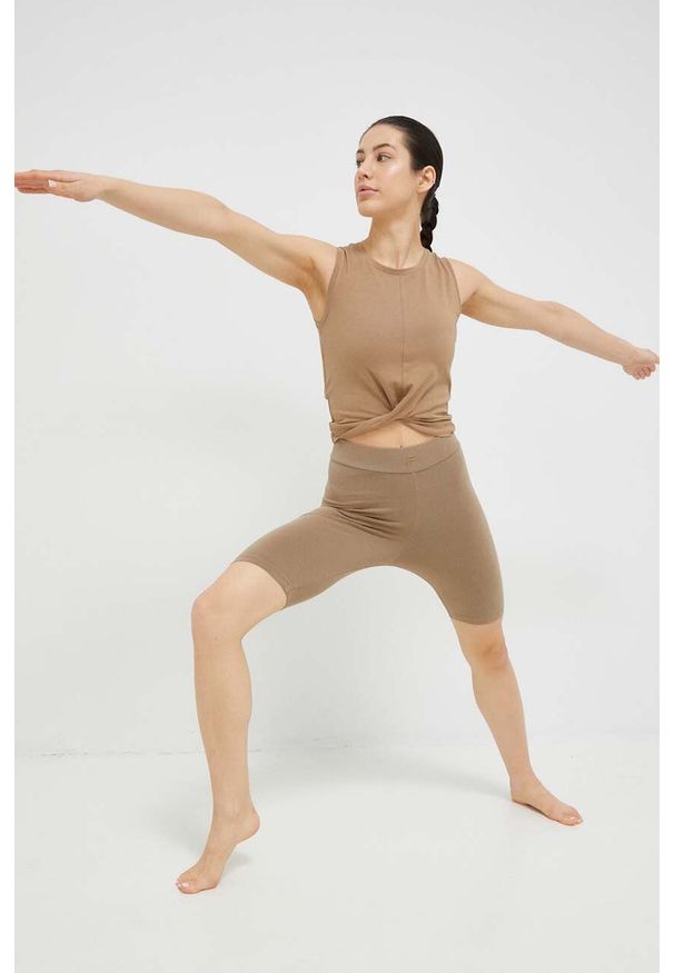 Fila szorty Collias damskie kolor zielony gładkie high waist. Stan: podwyższony. Kolor: zielony. Materiał: bawełna, skóra, dzianina. Wzór: gładki