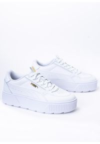 Sneakersy damskie białe Puma Karmen Rebelle. Zapięcie: pasek. Kolor: biały. Materiał: materiał, guma. Szerokość cholewki: normalna. Obcas: na platformie #1