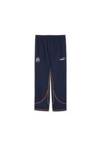Puma - Męskie spodnie dresowe ftblSTATEMENT Olympique Marsylia PUMA. Kolor: pomarańczowy, niebieski, wielokolorowy, żółty. Materiał: dresówka. Sport: piłka nożna