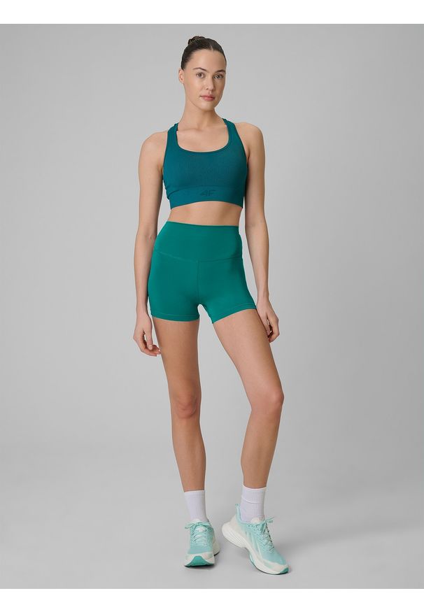 4f - 4F Legginsy krótkie treningowe damskie - turkusowe XS. Stan: podwyższony. Kolor: turkusowy. Materiał: włókno. Długość: krótkie