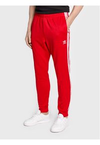 Adidas - Spodnie dresowe adidas. Kolor: czerwony. Materiał: dresówka #1