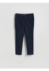 Reserved - Spodnie chino slim fit - granatowy. Kolor: niebieski. Materiał: tkanina, bawełna