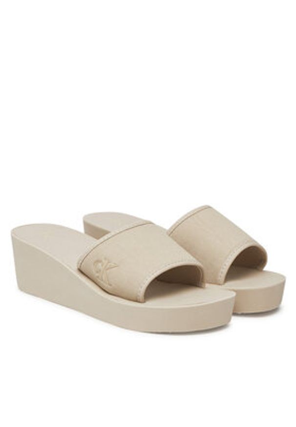 Calvin Klein Jeans Klapki Beach Wedge Slide Canvas YW0YW01725 Beżowy. Kolor: beżowy. Materiał: materiał