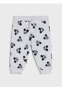 Sinsay - Spodnie dresowe jogger ze wzorem Mickey Mouse - szary. Kolor: szary. Materiał: dresówka. Wzór: motyw z bajki #1