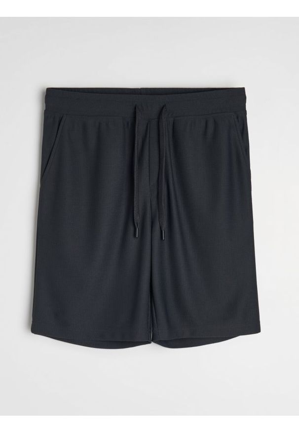 Sinsay - Szorty basic - niebieski. Kolor: niebieski