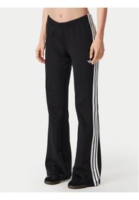Adidas - adidas Spodnie dresowe 3S Flared KQ6424 Czarny Regular Fit. Kolor: czarny. Materiał: bawełna #1