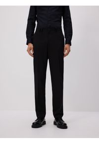 Reserved - Spodnie garniturowe slim fit - czarny. Kolor: czarny. Materiał: tkanina, wiskoza