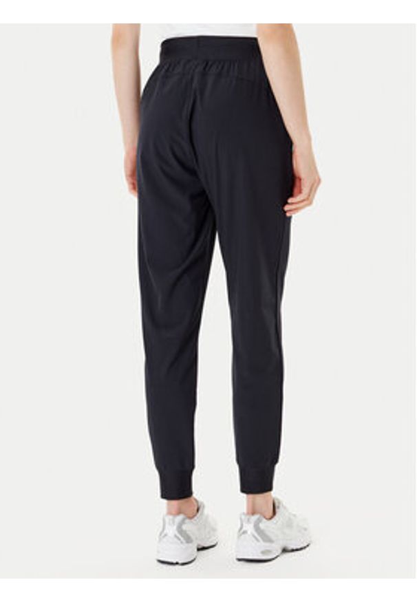Under Armour Spodnie dresowe Armoursport High Rise Wvn Pnt 1382727-001 Czarny Loose Fit. Kolor: czarny. Materiał: syntetyk