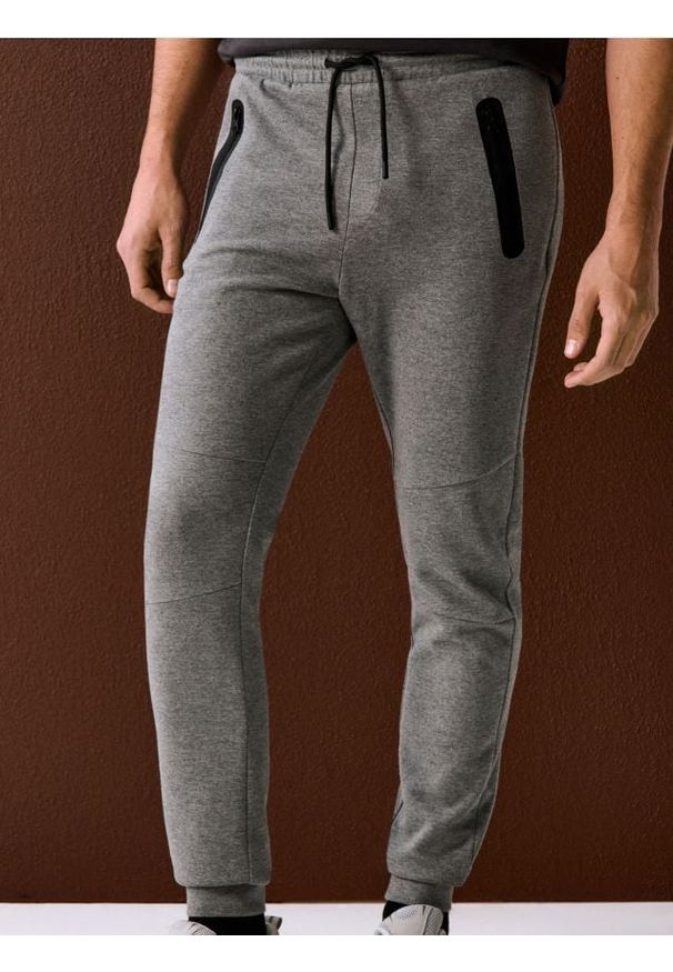 Sinsay - Spodnie dresowe jogger - szary. Kolor: szary. Materiał: dresówka