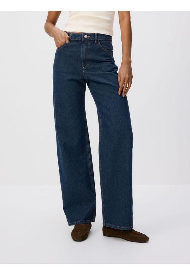 Reserved - Jeansy wide leg - granatowy. Kolor: niebieski