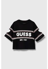 Guess t-shirt bawełniany dziecięcy kolor czarny. Okazja: na co dzień. Kolor: czarny. Materiał: bawełna. Długość rękawa: krótki rękaw. Długość: krótkie. Styl: casual, klasyczny