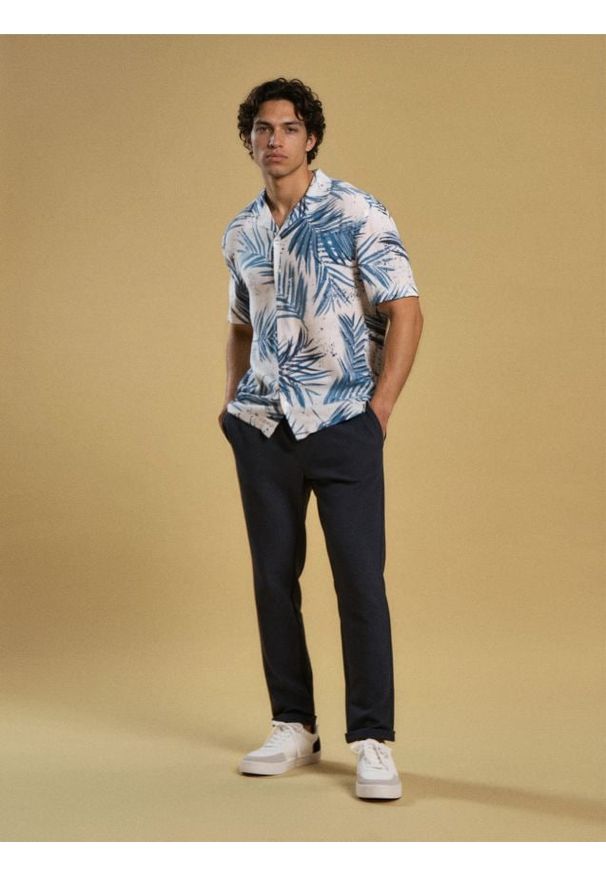 Sinsay - Spodnie dresowe jogger - szary. Kolor: szary. Materiał: dresówka