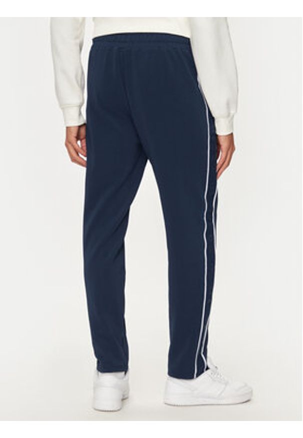 Ellesse Spodnie dresowe Inzagi SHX20959 Granatowy Regular Fit. Kolor: niebieski. Materiał: syntetyk
