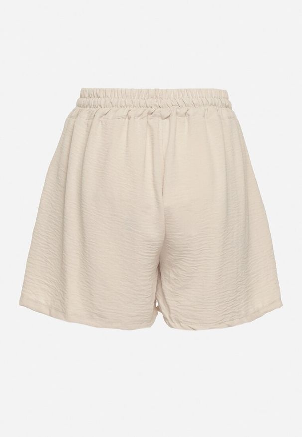 Born2be - Beżowe Luźne Szorty z Wysokim Stanem i Gumką w Pasie Vimarias. Okazja: na co dzień, do pracy. Stan: podwyższony. Kolor: beżowy. Długość: krótkie. Styl: casual, elegancki