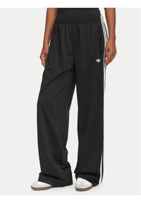 Adidas - adidas Spodnie dresowe Pinstripe Firebird KS6787 Czarny Loose Fit. Kolor: czarny. Materiał: syntetyk #1