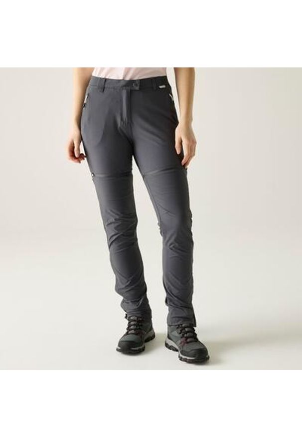 Regatta - Spodnie damskie z odpinanymi nogawkami Mountain Zip Off. Kolor: niebieski, szary, wielokolorowy. Materiał: elastan, poliamid. Sezon: lato. Sport: turystyka piesza