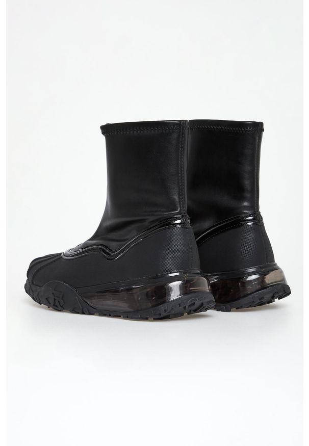 Botki damskie wysoką cholewką DKNY. Wysokość cholewki: przed kolano. Szerokość cholewki: normalna